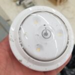 White disc lights button