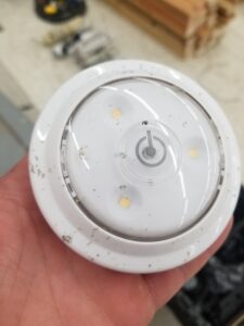 White disc lights button